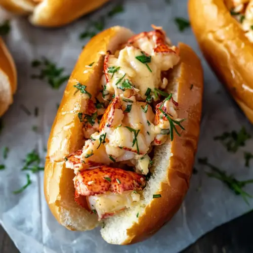 Savory Lobster Roll with Warm Butter and Fresh Herbs 9 Lobster Roll